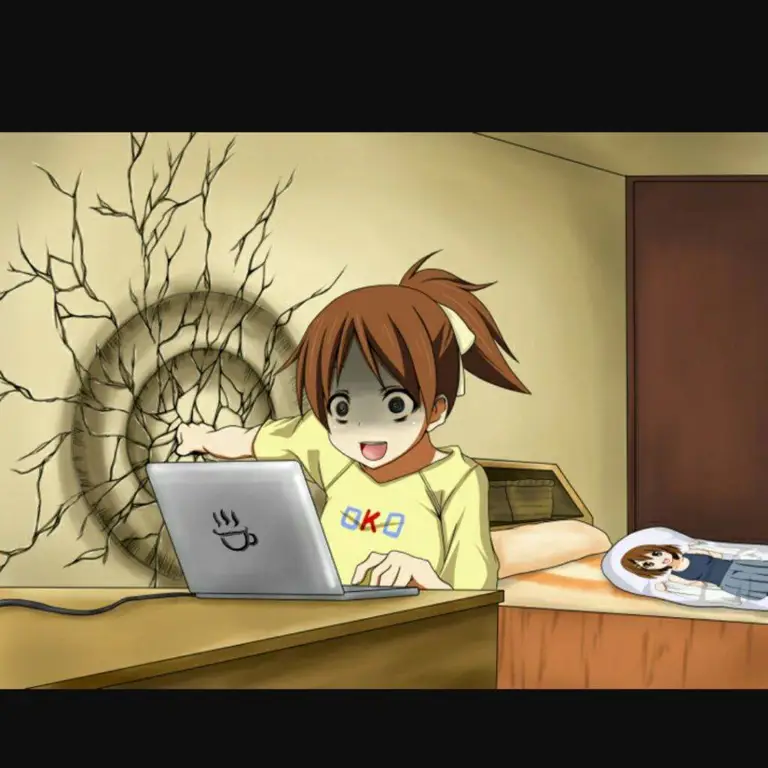 Menikmati Anime di Laptop Seseorang menonton anime di laptopnya