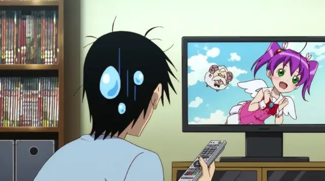 Menikmati Anime Kualitas HD Seseorang menonton anime di laptop